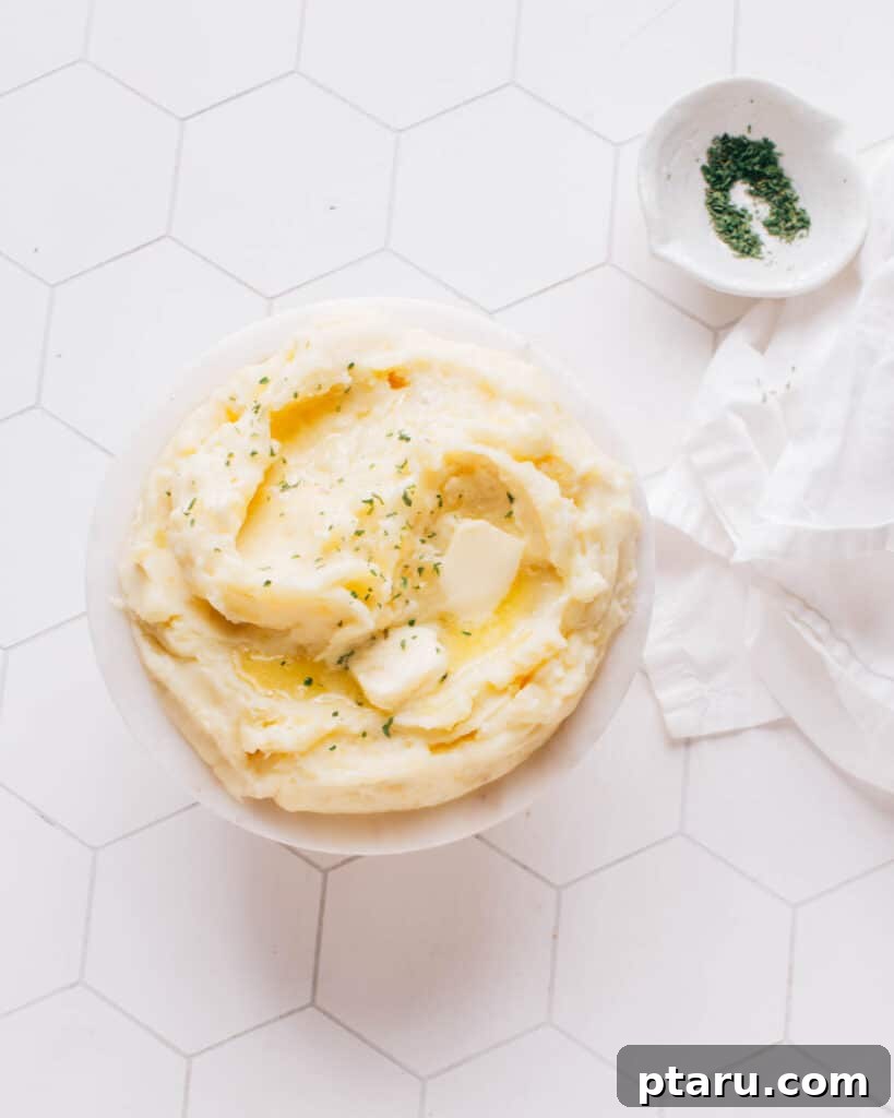 31 Delicious Sides to Elevate Your Meatloaf 5 A bowl of mashed potatoes with butter.