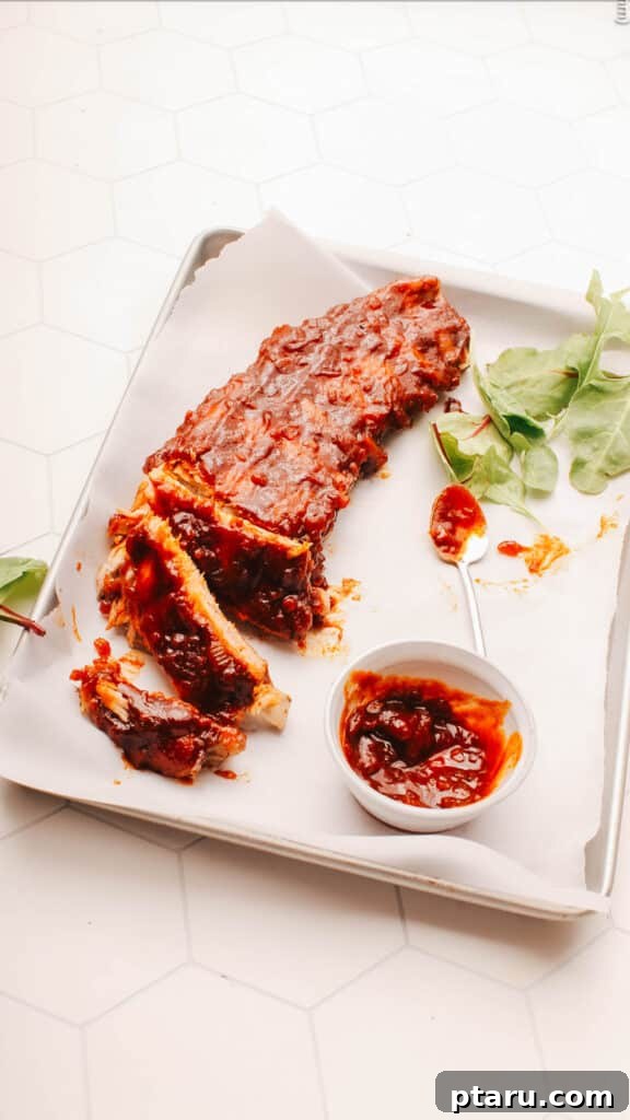 Perfect Pairings 21 Delicious Sides for Mac and Cheese 4 Spicy Sticky ribs on a plate with extra sauce.