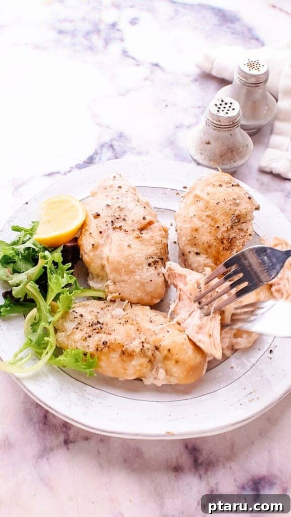 The Ultimate No-Thaw Instant Pot Chicken Recipe 9 Serving frozen chicken in a dish, garnished and ready.