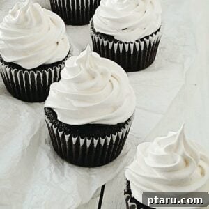 Finished Caramallow Cupcakes with rich chocolate, caramel, and marshmallow layers