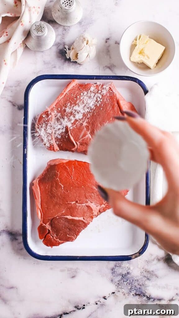 Meltingly Tender Instant Pot Steak with Rich Pan Sauce 4 Adding salt on steak