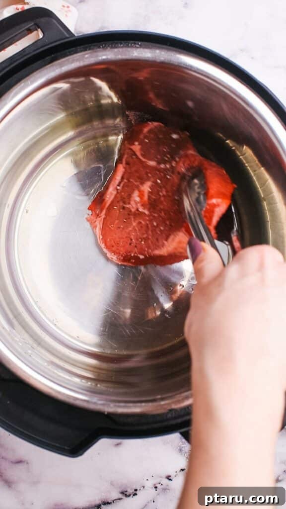 Meltingly Tender Instant Pot Steak with Rich Pan Sauce 5 searing the steak