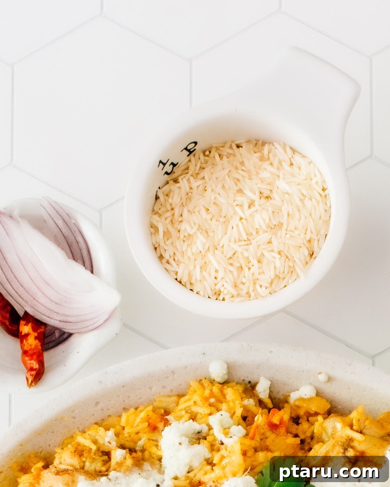 My Indian Mother-in-Laws Foolproof Basmati Rice 9 A bowl of fluffy basmati rice, perfectly prepared and ready to serve.