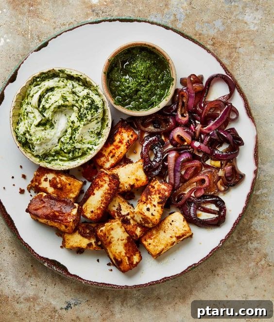 Over 50 Irresistible Paneer Recipes 13 Koftas In Spicy Sauce, elegantly presented.