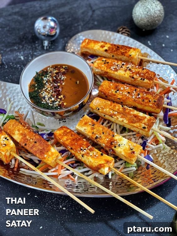 Over 50 Irresistible Paneer Recipes 14 Thai Paneer Satay in plate, colorful and inviting.