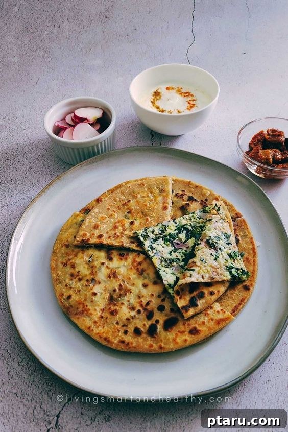 Over 50 Irresistible Paneer Recipes 20 Palak Paneer Paratha, flaky and delicious.