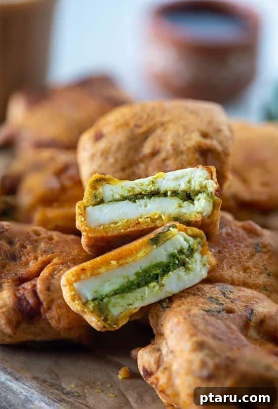 Over 50 Irresistible Paneer Recipes 26 Paneer Pakoda, perfectly golden and stuffed.