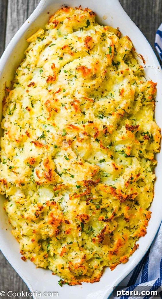 Cozy Winter Comfort: 33 Hearty Casserole Creations 33 Loaded Twice Baked Potato Casserole, featuring creamy potatoes, crispy bacon, and melted cheese.