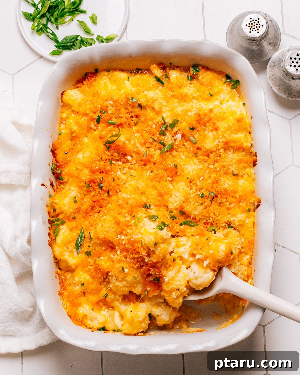Cozy Winter Comfort: 33 Hearty Casserole Creations 5 Hearty and cheesy Cauliflower Casserole recipe with optional crispy bacon.