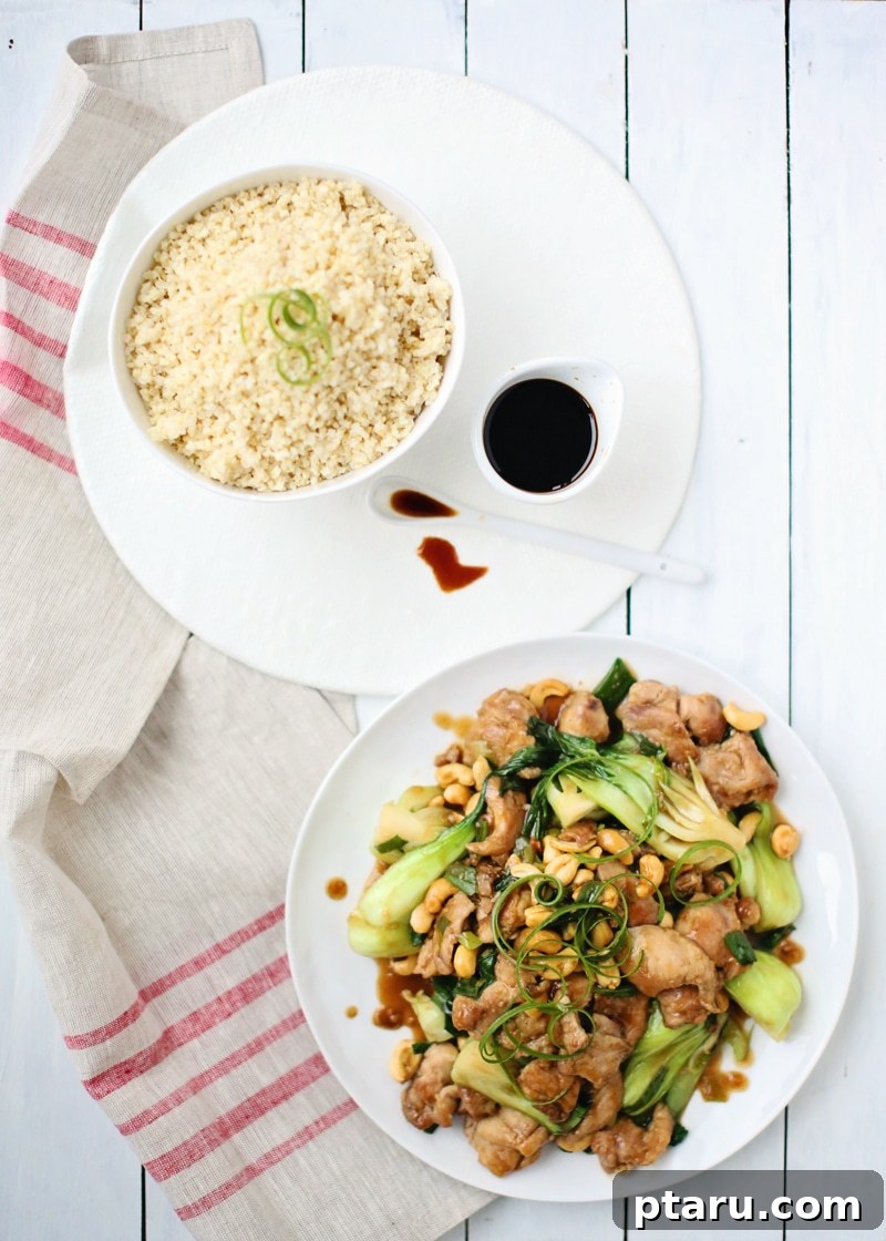 Cooked Cashew Chicken with grains, ready to be served.