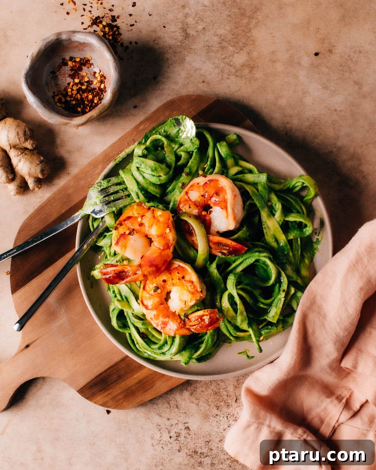 Ultimate Creamy One Pot Pasta with Greens 4 One Pot Creamy Pasta and Greens topped with succulent cooked shrimp, garnished with fresh mint and a lime wedge.