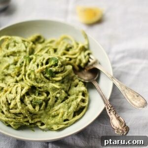 One-Pot Creamy Pasta and Greens, beautifully plated, showcasing the vibrant green sauce and tender linguine.