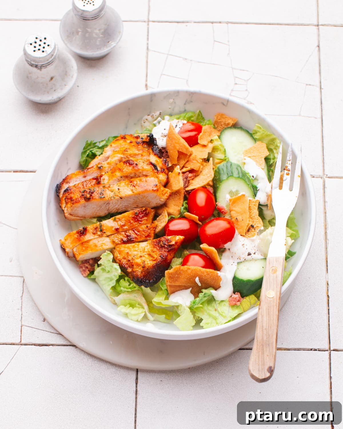 Air Fryer Frozen Chicken Breast: Effortlessly Tender and Juicy 4 Air fryer chicken breast on a salad.