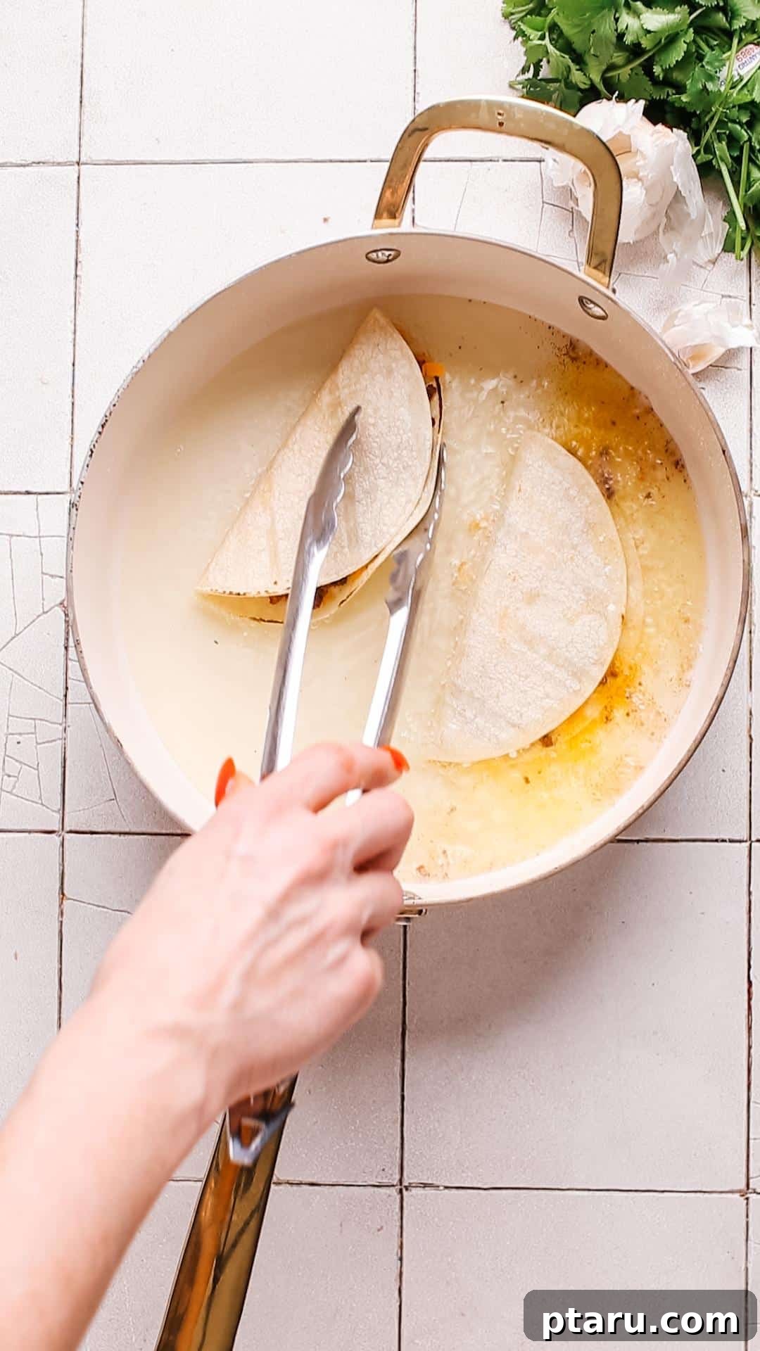 Crispy Fried Tacos Made Easy 3 Golden-brown, filled tacos sizzling in hot oil in a frying pan, achieving perfect crispness.