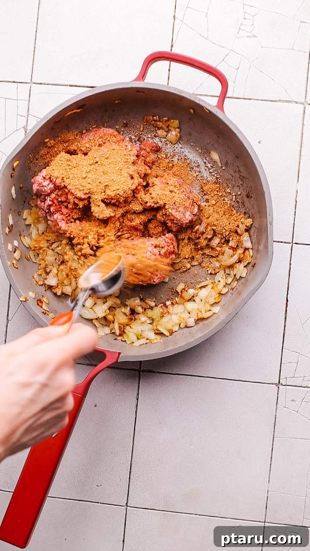 Crispy Fried Tacos Made Easy 5 Ground beef cooking in a skillet with taco seasoning and onions, ready for taco filling.