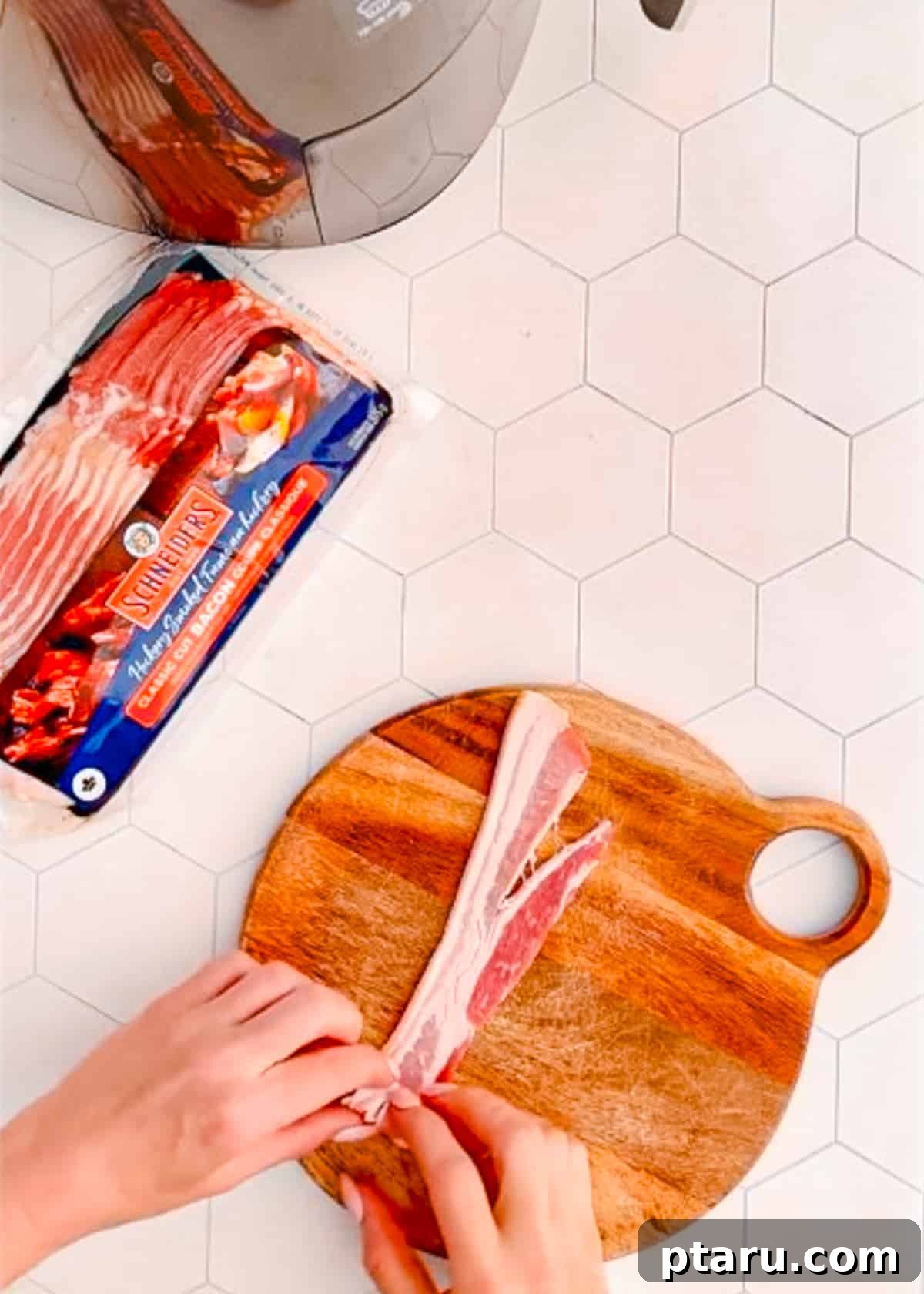 Mastering Big Batch Crispy Bacon in Your Air Fryer 6 Expertly rolling a strip of bacon into a tight rosette, preparing it for a large batch cook in the air fryer.