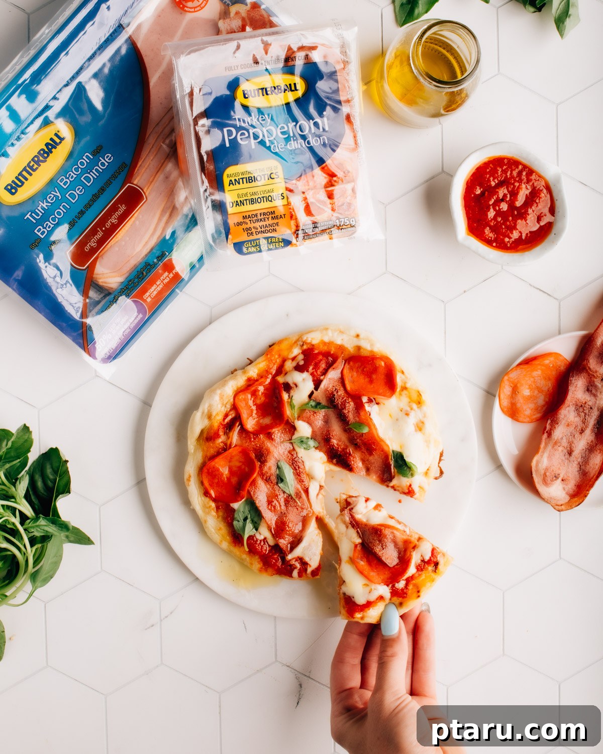 Mastering Big Batch Crispy Bacon in Your Air Fryer 7 Air Fryer turkey bacon slices artfully arranged on a freshly baked pizza, highlighting its potential as a versatile topping.