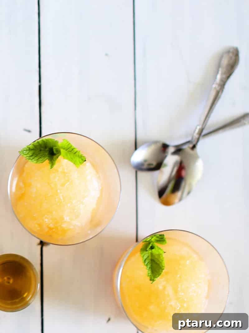 Homemade Peach Snow Cone Delight 2 A vibrant bowl of homemade peach shaved ice, garnished with fresh peach slices, ready to be enjoyed.