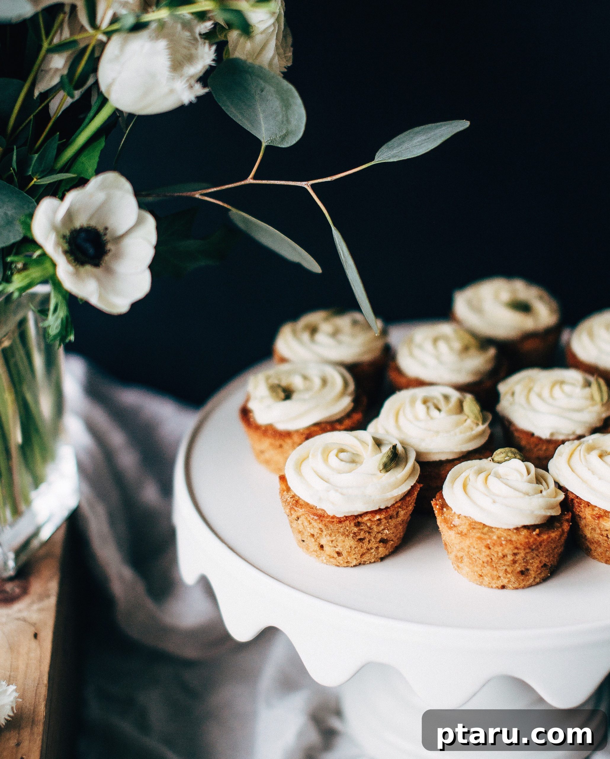 Richly Spiced Parsnip Cupcakes with Velvety Cream Cheese Frosting 3 A close-up of a freshly baked parsnip cupcake, revealing its light, tender crumb and inviting texture.