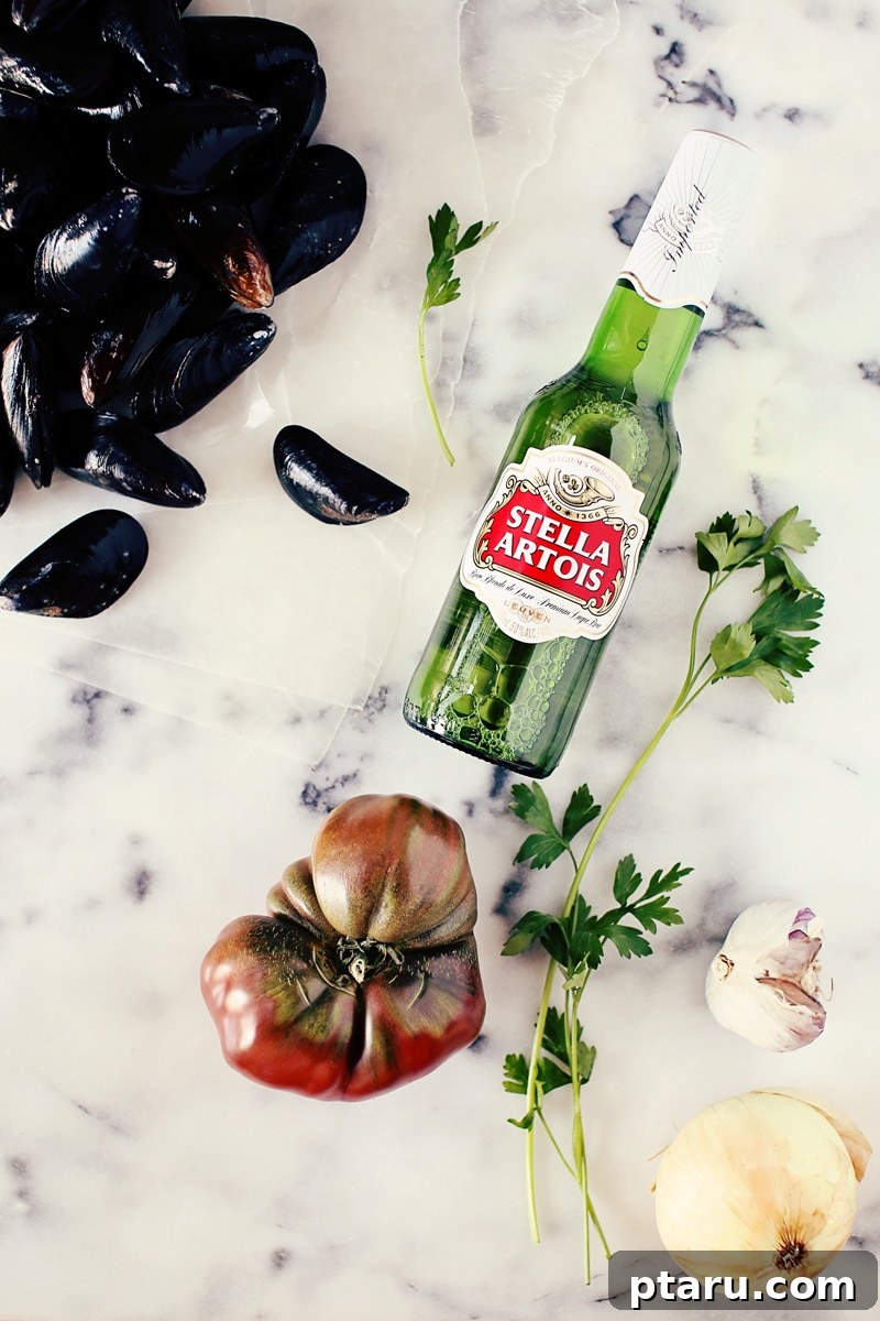 Beer-Kissed Mussels 4 Fresh mussels in a pot with vegetables and Stella Artois beer.