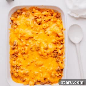No-Fuss Cheeseburger Dinner 9 Cheeseburger Casserole recipe. A mouthwatering image of the finished casserole with a golden-brown cheesy top.