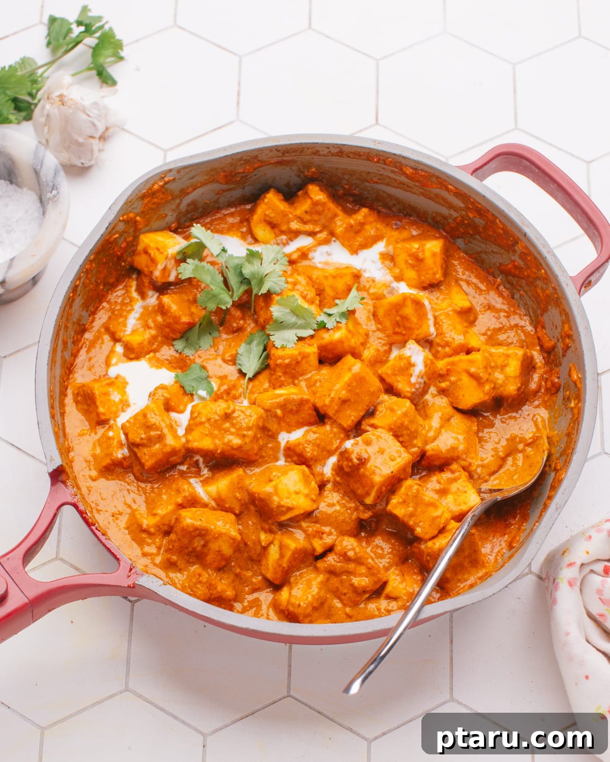 Creamy Butter Paneer 2 Butter Paneer in pan, glistening with rich, creamy sauce, ready to be served.