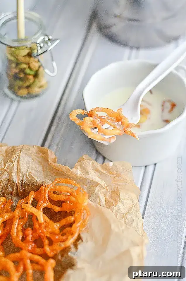 Easy Indian Desserts and Sweets: Crowd-Pleasing Showstoppers 11 Crisp, golden-orange Jalebi spirals, soaked in saffron syrup, a popular Indian sweet.