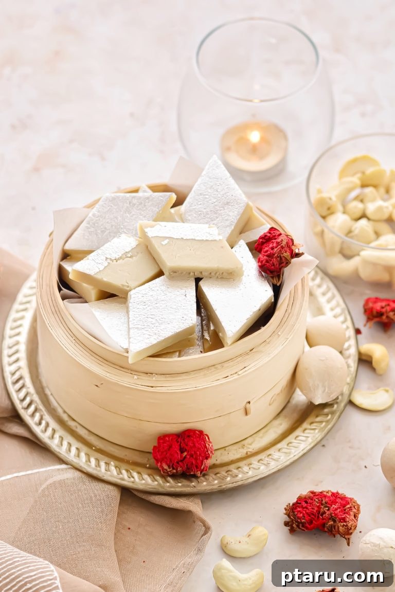 Easy Indian Desserts and Sweets: Crowd-Pleasing Showstoppers 16 Elegant diamond-shaped Kaju Katli, a smooth and rich Indian cashew fudge, often decorated with silver leaf.