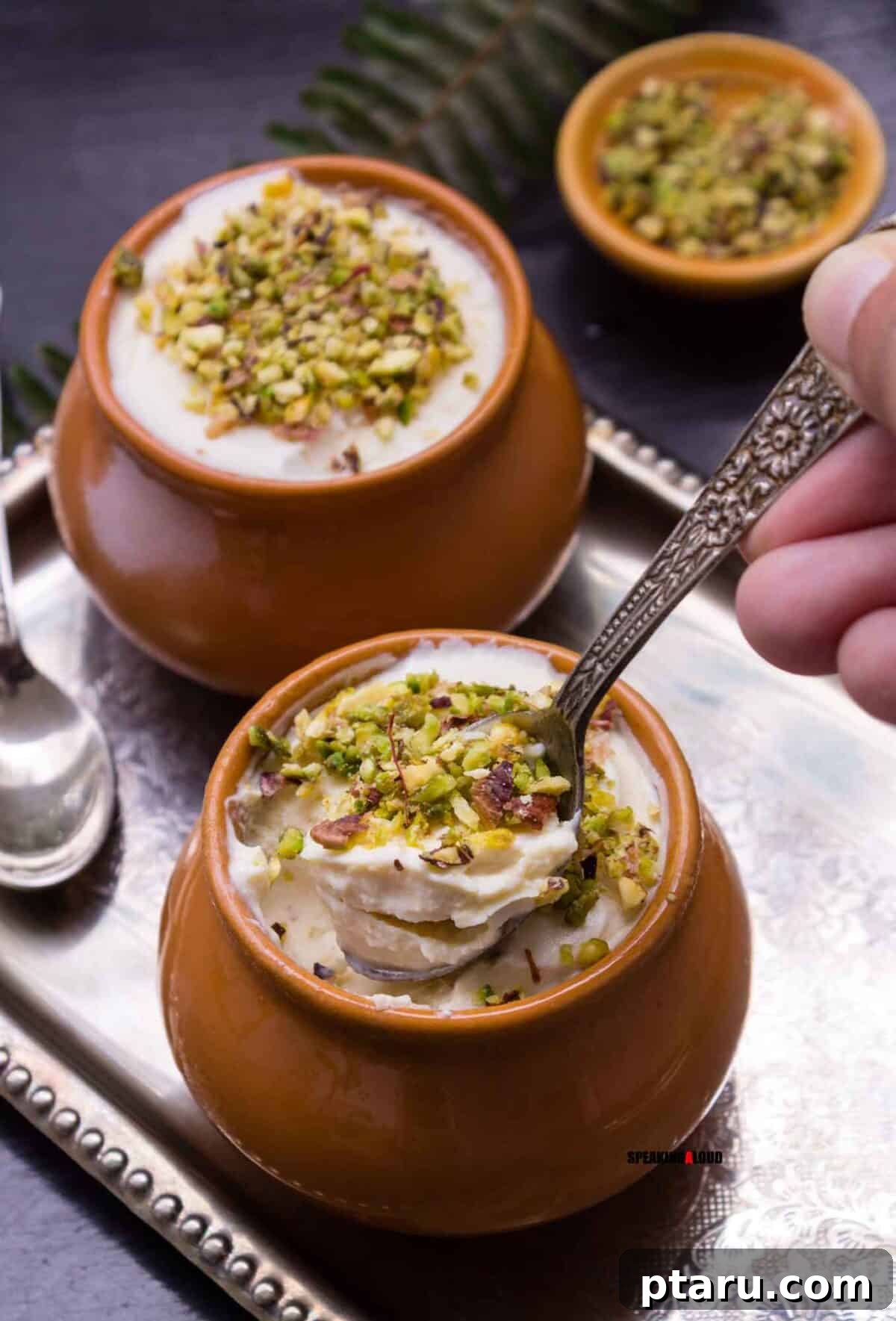Easy Indian Desserts and Sweets: Crowd-Pleasing Showstoppers 21 Traditional Kesar Badam Matka Kulfi, pistachio-saffron ice cream elegantly set in small clay pots.
