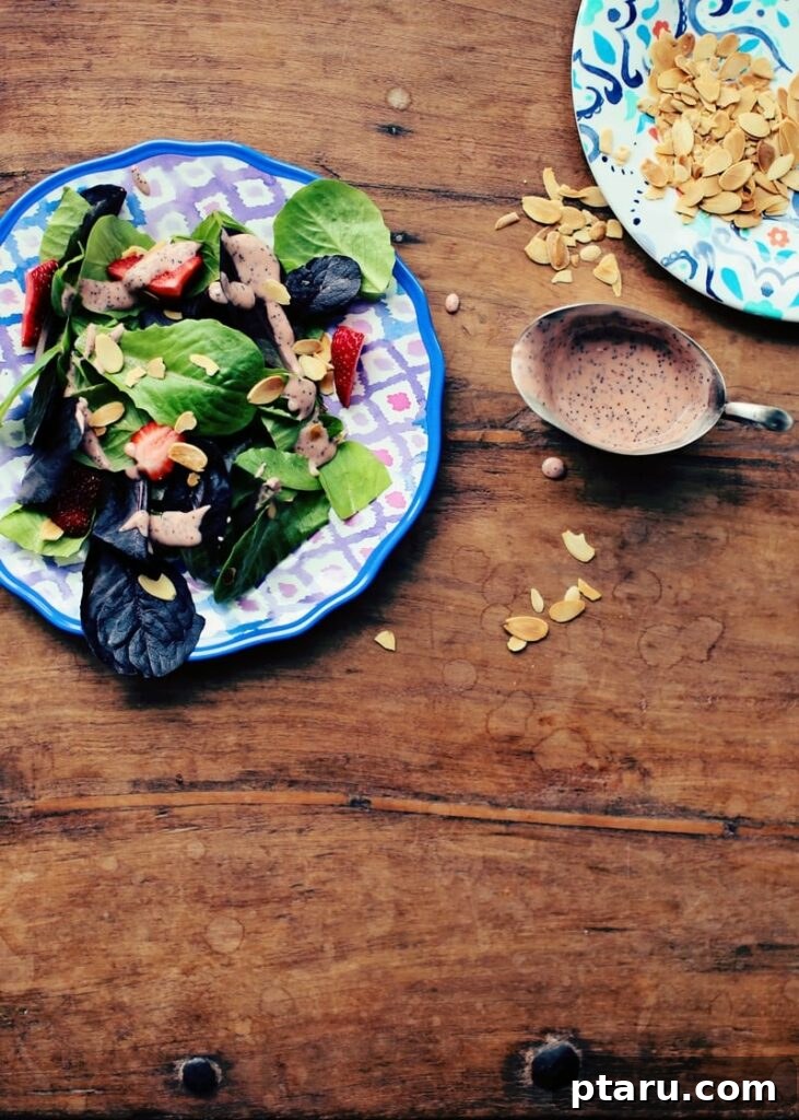 Favorite Easy Rhubarb Recipes You'll Make Forever 13 A vibrant green salad drizzled with a pink Rhubarb Dressing.