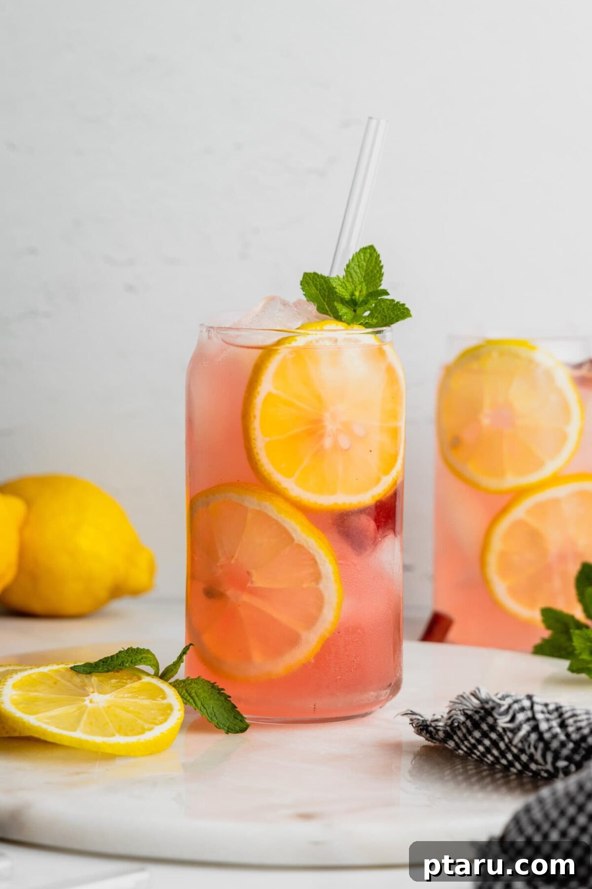 Favorite Easy Rhubarb Recipes You'll Make Forever 22 Glasses of refreshing Rhubarb Lemonade with lemon slices.