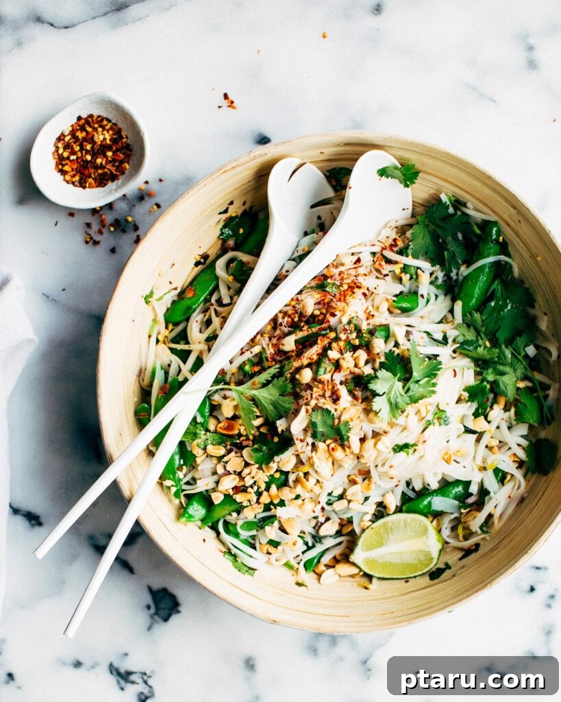 Your Ultimate Guide to Salmon Side Dishes 20 Colorful Thai Noodle Salad with Sweet Chili Dressing, full of fresh ingredients.