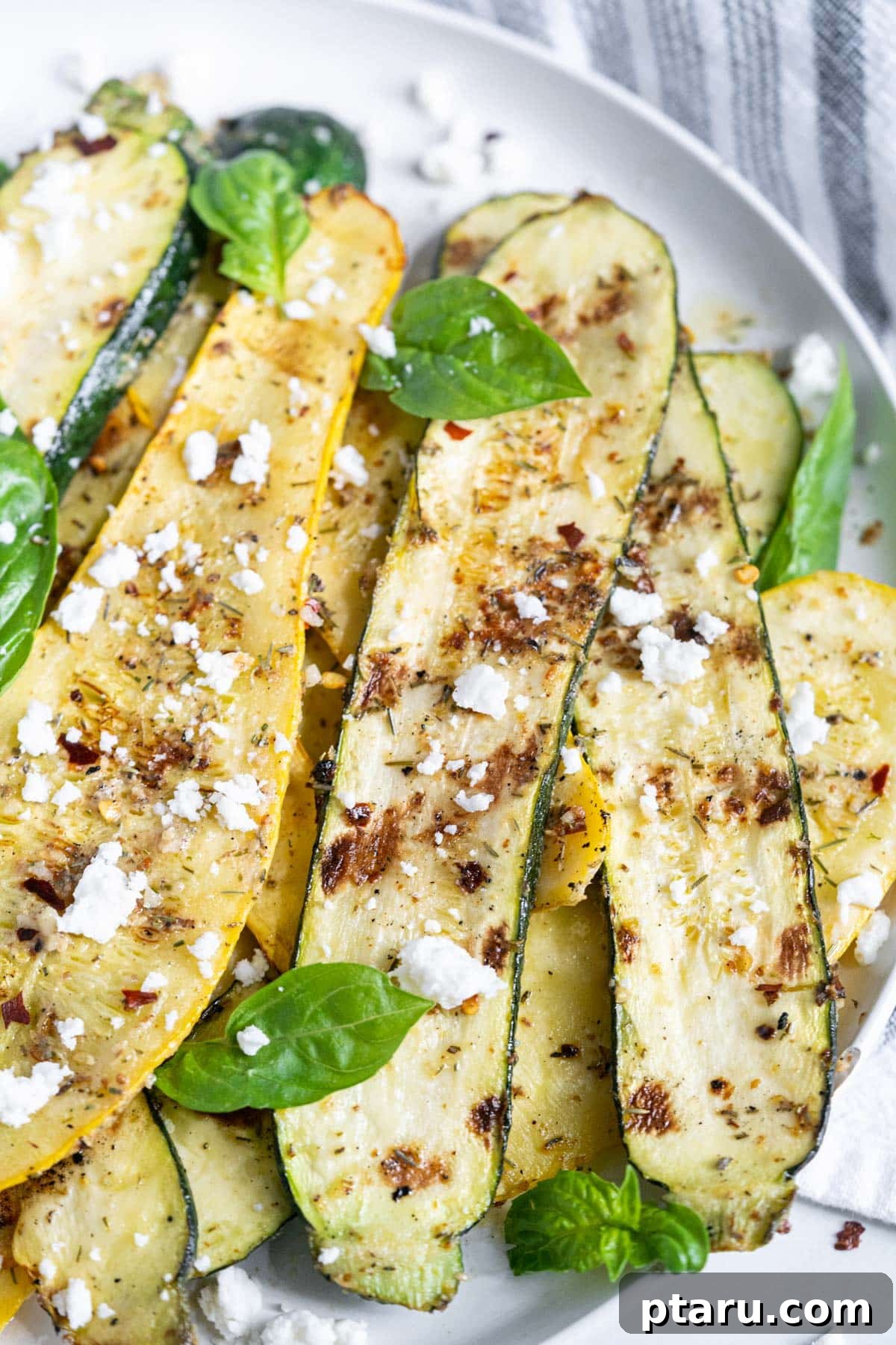 Your Ultimate Guide to Salmon Side Dishes 9 Beautifully Grilled Zucchini and Squash with elegant grill marks.