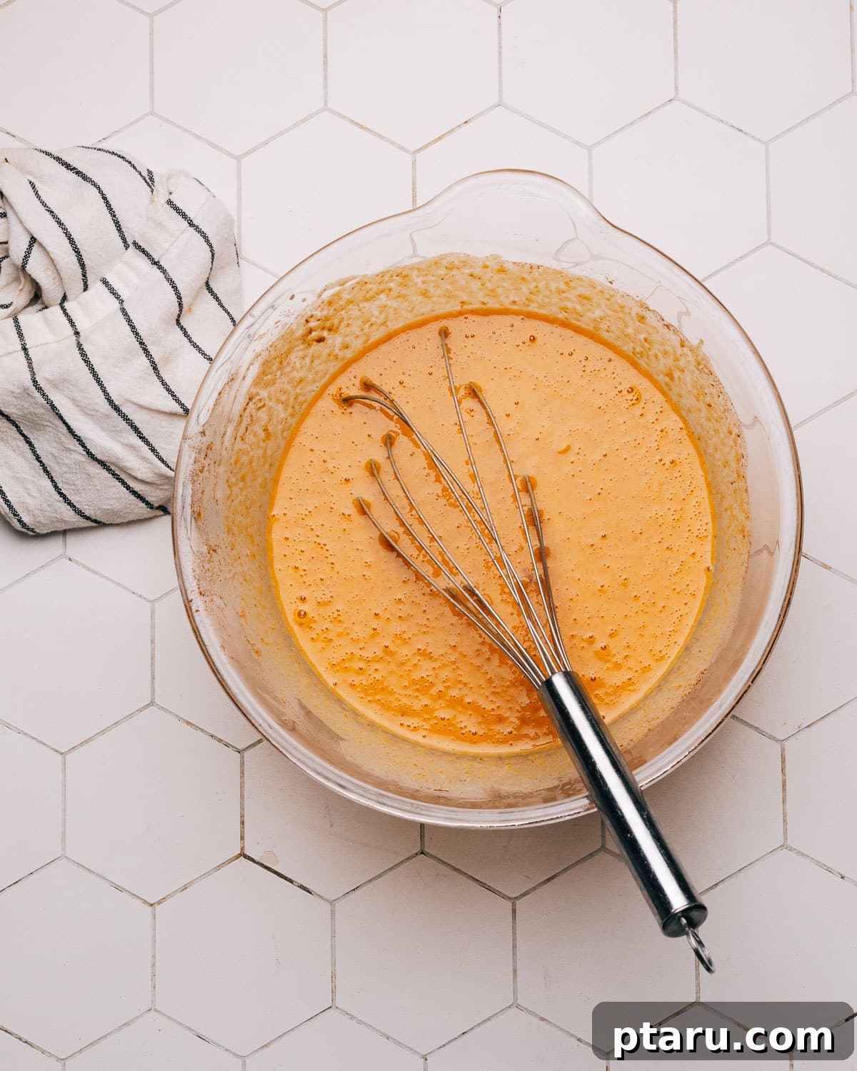 Golden Autumn Spice Cake 3 Step-by-step instructions on how to prepare pumpkin cake batter.