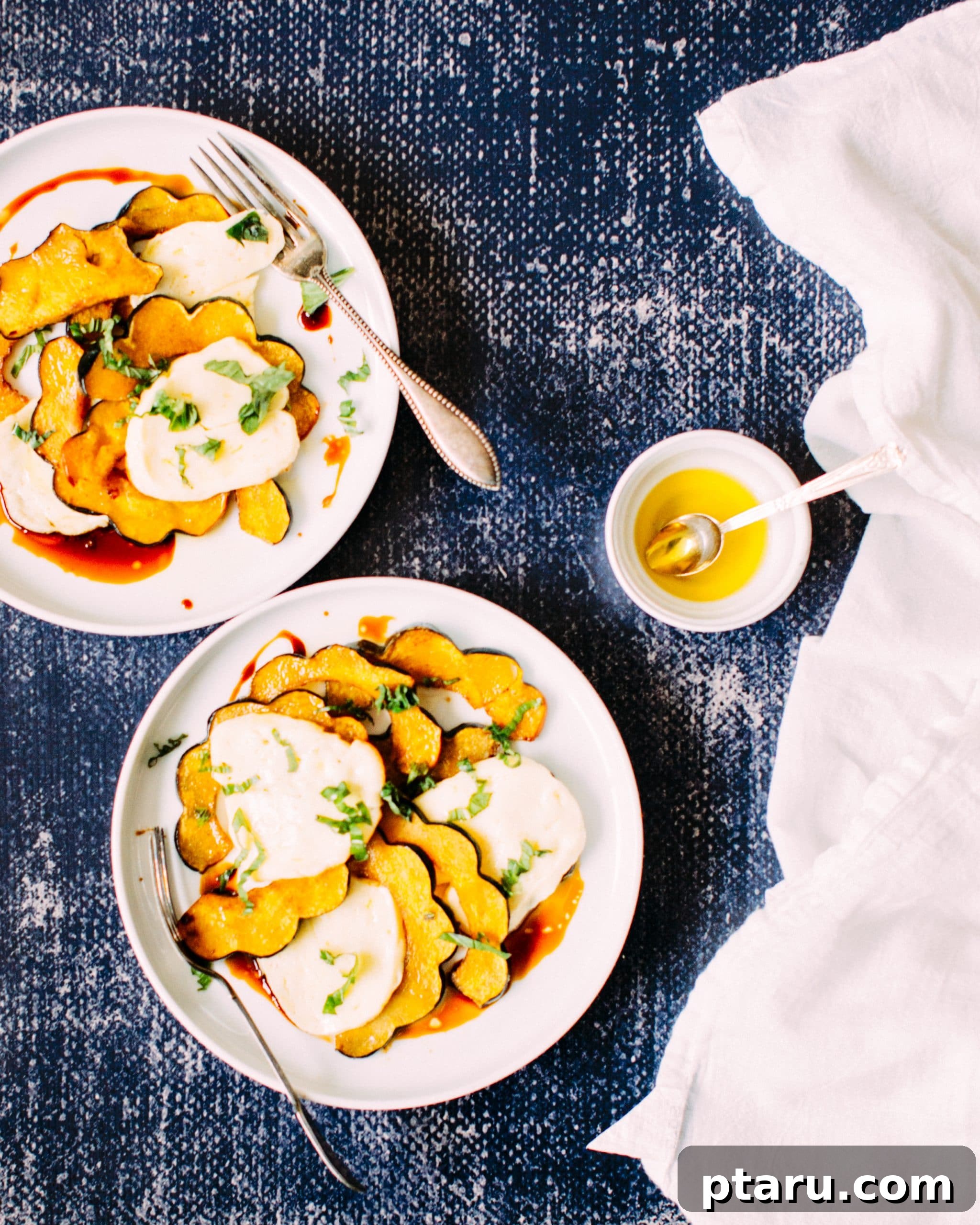 Golden-Roasted Maple-Spiced Squash and Halloumi Salad 5 A close-up of the finished Spiced Maple-Roasted Squash & Halloumi Salad, garnished with fresh basil and a glossy drizzle of pomegranate molasses.