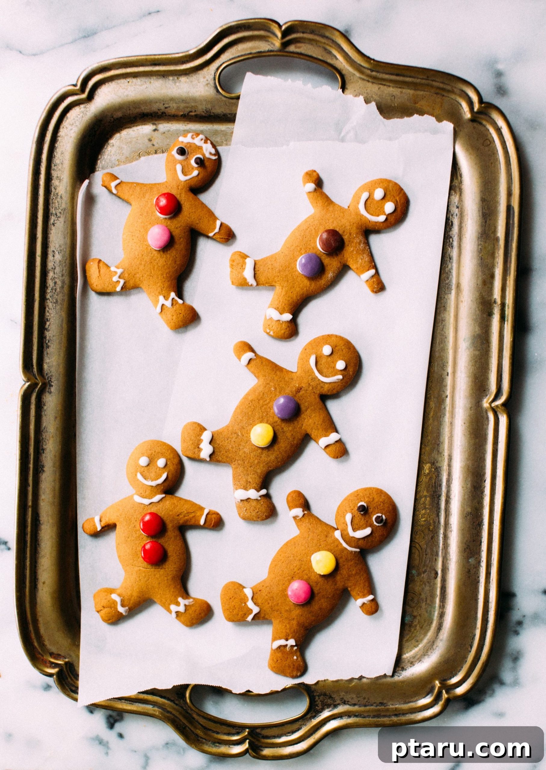 Irresistibly Soft and Chewy Gingerbread Men 5 Decorated gingerbread men cookies with festive royal icing and candy buttons