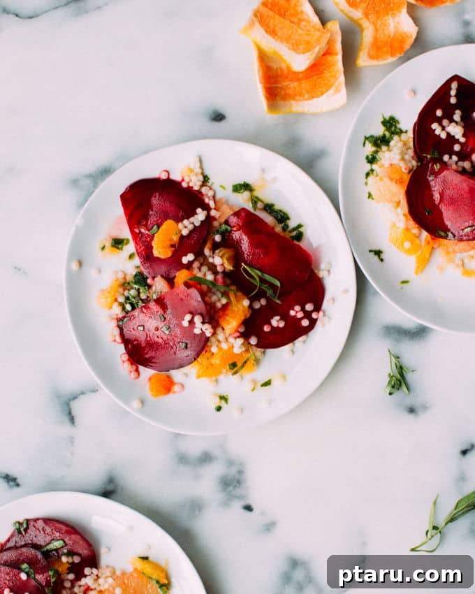 Jeweled Beet and Citrus Medley with Fragrant Tarragon 2 Beautifully arranged Beet and Citrus Salad with vibrant colors and fresh tarragon leaves