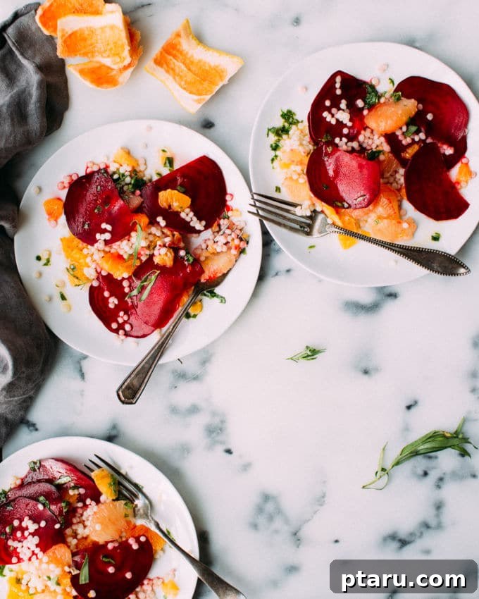 Jeweled Beet and Citrus Medley with Fragrant Tarragon 4 Fresh tarragon leaves garnishing a vibrant Beet and Citrus Salad, highlighting the aromatic herb