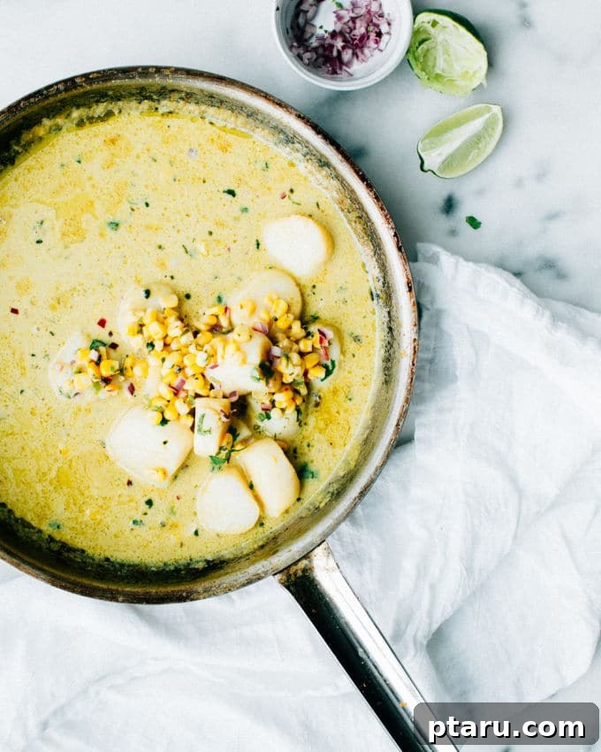 Tropical Thai Coconut Scallops with Tangy Corn Relish 4 A serving of Thai Coconut Scallops with a fresh, colorful corn relish on top.