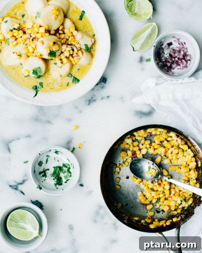 Tropical Thai Coconut Scallops with Tangy Corn Relish 5 Cooked Thai Coconut Scallops in a pan, ready to be served.