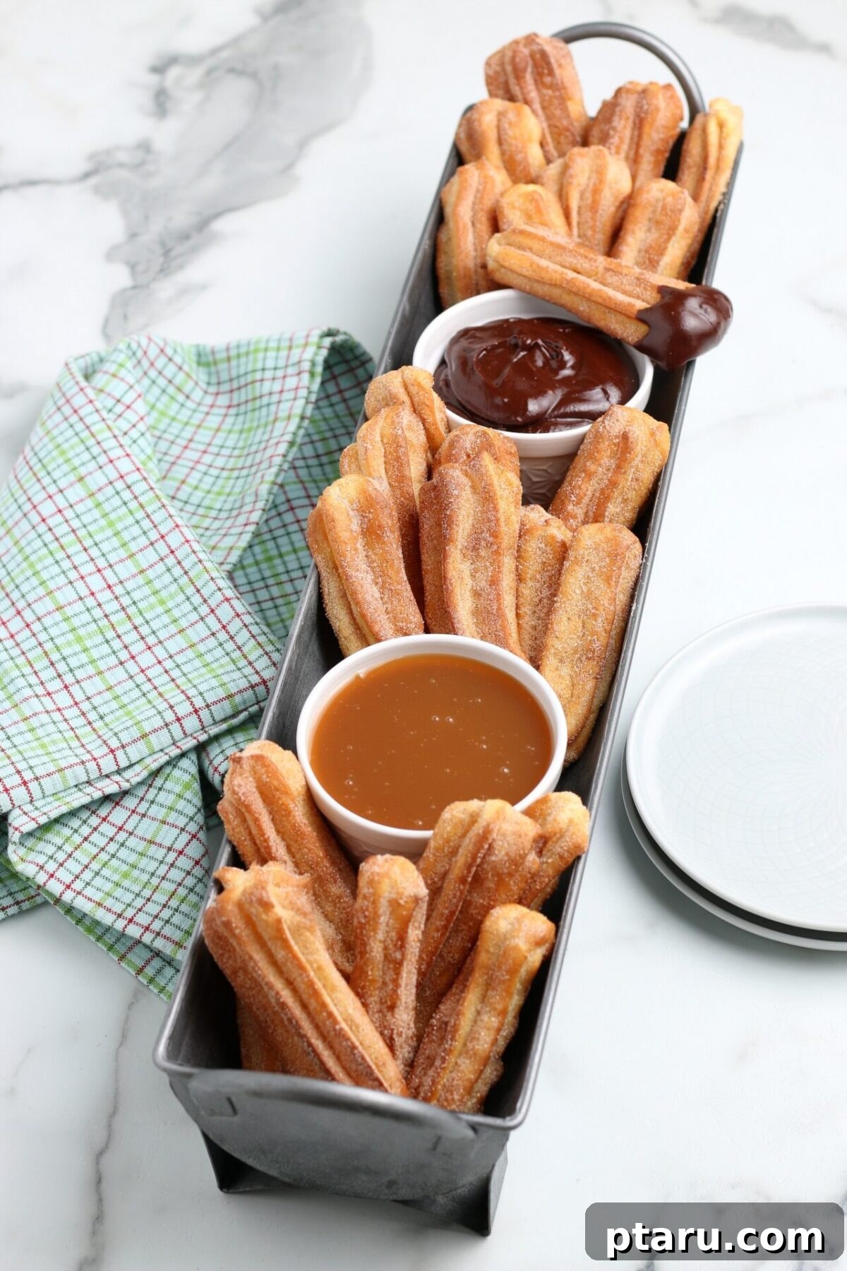 Over 25 Mexican Dessert Recipes You Must Try 5 Crispy Churros dusted with cinnamon sugar, ready for dipping