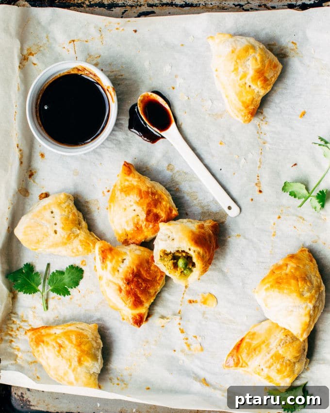 Effortless Flaky Samosas 3 Close-up of golden brown flaky samosas made with a shortcut recipe