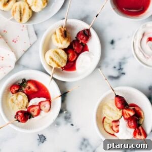 A top-down view of a grilled strawberry shortcake kebab, beautifully plated.