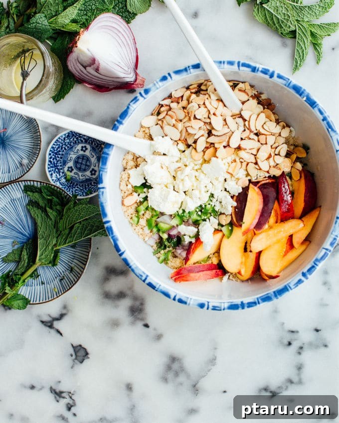 Peachy Mint Grilled Chicken Couscous Salad 5 Individual serving of Grilled Chicken Couscous Salad garnished with mint