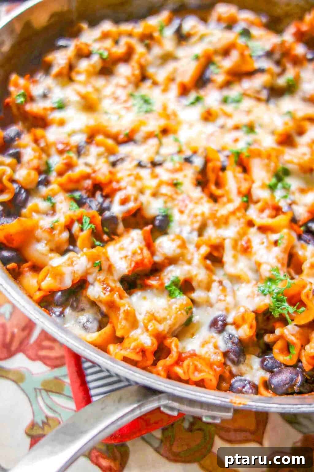 Chicken Pasta Bakes You Cant Get Enough Of 15 Creamy and spicy Chicken Enchilada Pasta Bake in a skillet.