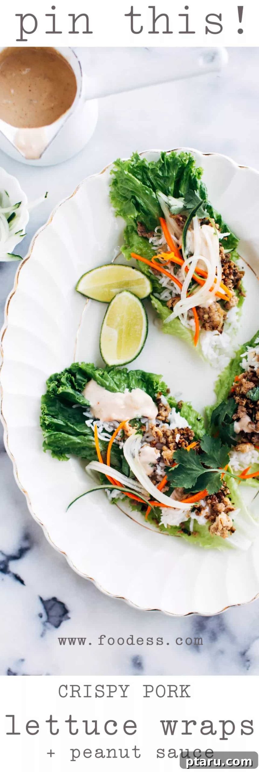 Crispy Pork Lettuce Wraps with Savory Peanut Sauce 4 A vibrant platter of crispy pork and tofu lettuce wraps, garnished with fresh cilantro and lime, ready to be served.