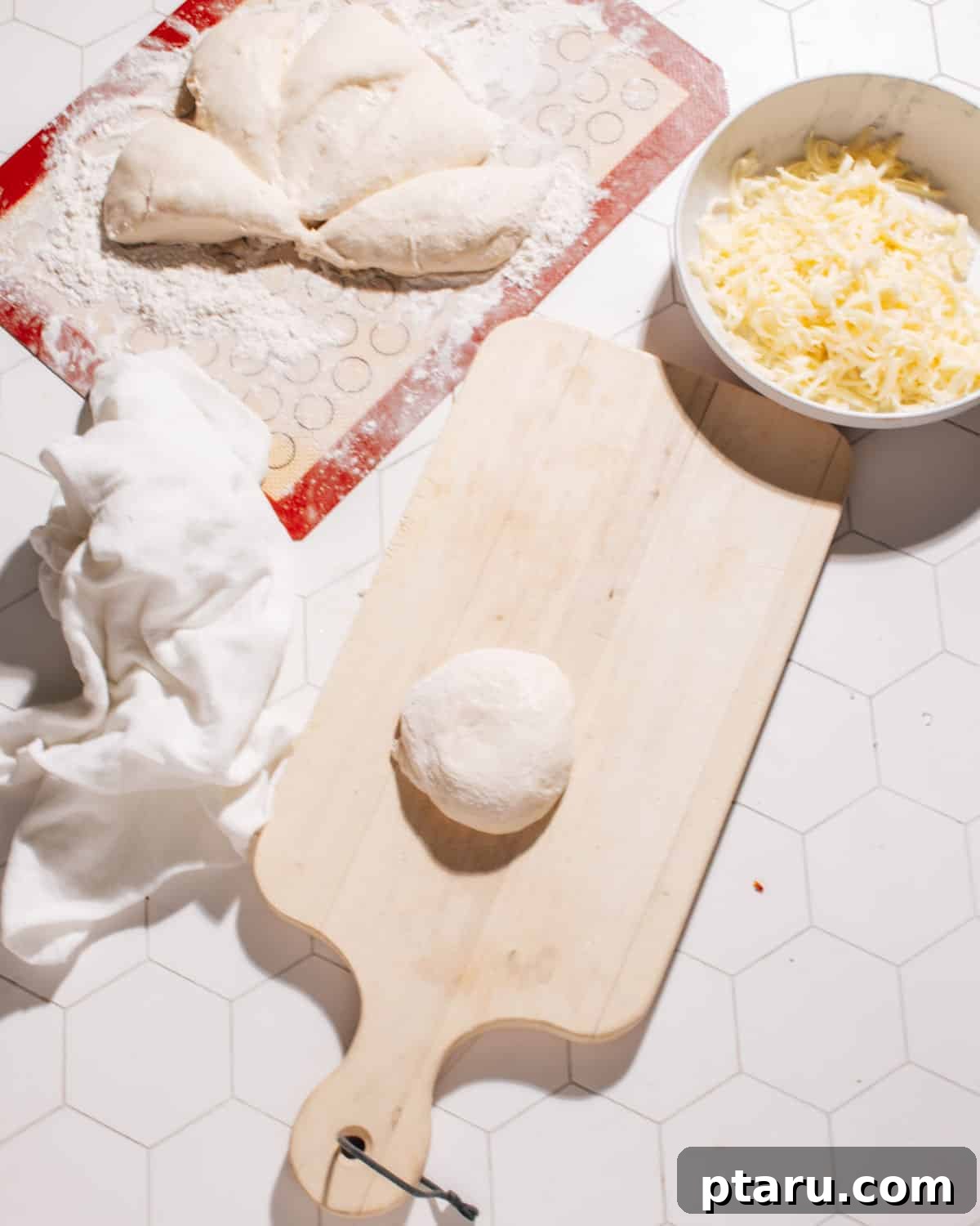Gooey Cheese Naan 3 Dough on rolling pad Cheese Naan