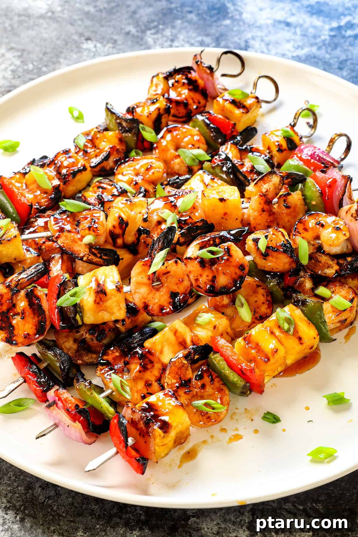 20+ Guilt-Free Shrimp Recipes for Dinner: Absolutely Delicious! 13 Hawaiian Shrimp Kabobs with Veggies, perfectly grilled on skewers.