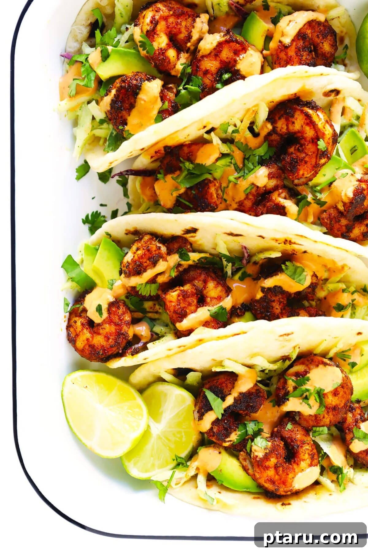 20+ Guilt-Free Shrimp Recipes for Dinner: Absolutely Delicious! 15 Shrimp Tacos with fresh toppings, served on a wooden board.