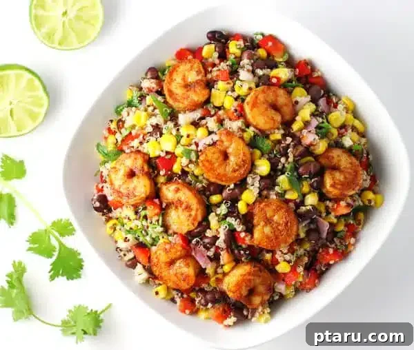 20+ Guilt-Free Shrimp Recipes for Dinner: Absolutely Delicious! 16 Caribbean Shrimp Quinoa Bowl, full of colorful ingredients.